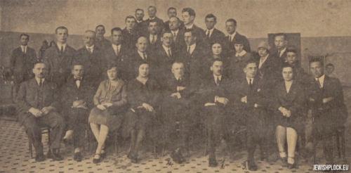 Staff of the Płock Municipal Power Plant. Seated (from the left): Ignacy Ukryn, Henryk Szenwic, Janina Wierzchowska, Felicja Hakowska, Ignacy Starzyński (director of the power plant), Aleksander Albrecht (mayor of the town of Płock), Roman Grudziński, Jadwiga Rybińska, Izajasz Cybulski. Standing above the director in the second row: Woźnikowski, Julian Gron, H. Bielecki, K. Chęcińska and J. Grażulewiczówna. In the third row: Bogusławski, Hejne, K. Dolecki, Jędrzejak and W. Garwacki (source: "Mazowsze Płockie i Kujawy" no. 10-11 of October-November 1929)